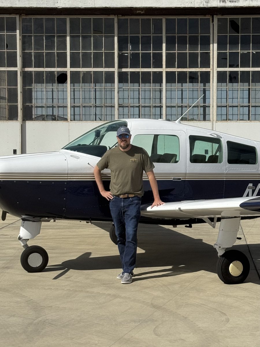 Josh, founder of ACS MasterKey, at the hangar